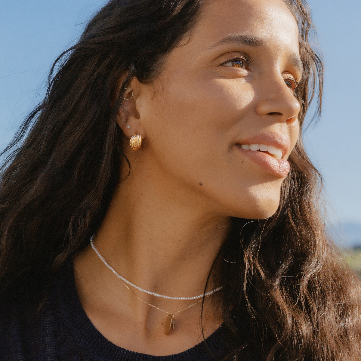 Sol Crossover Hoop Earrings