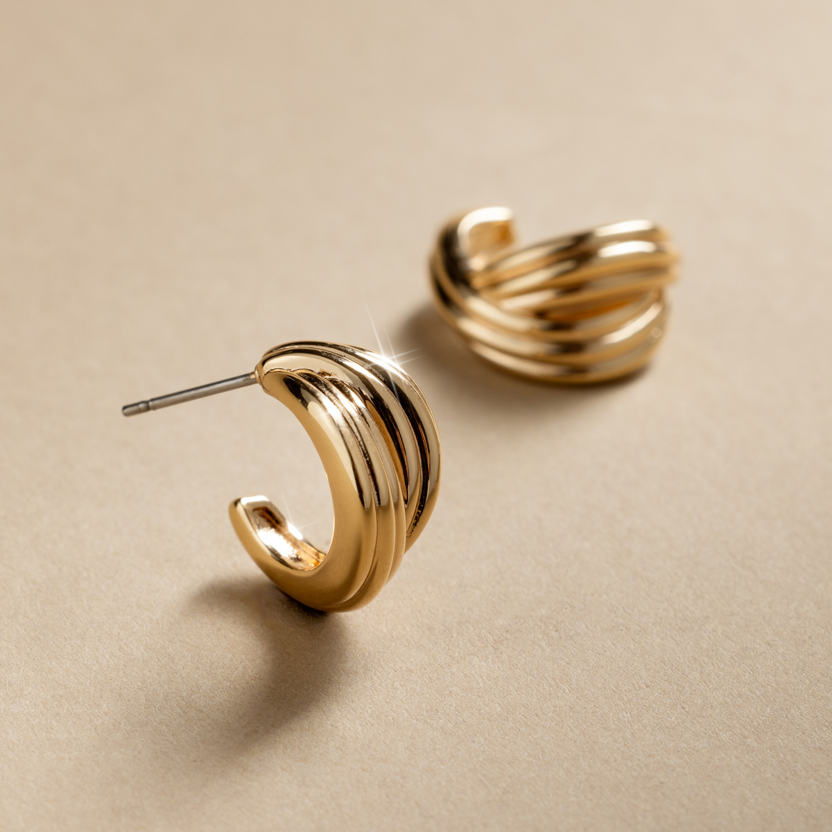 Sol Crossover Hoop Earrings